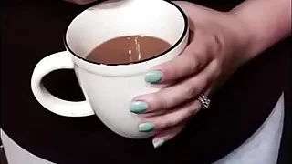Lactating fat tit squeezes breast milk into coffee